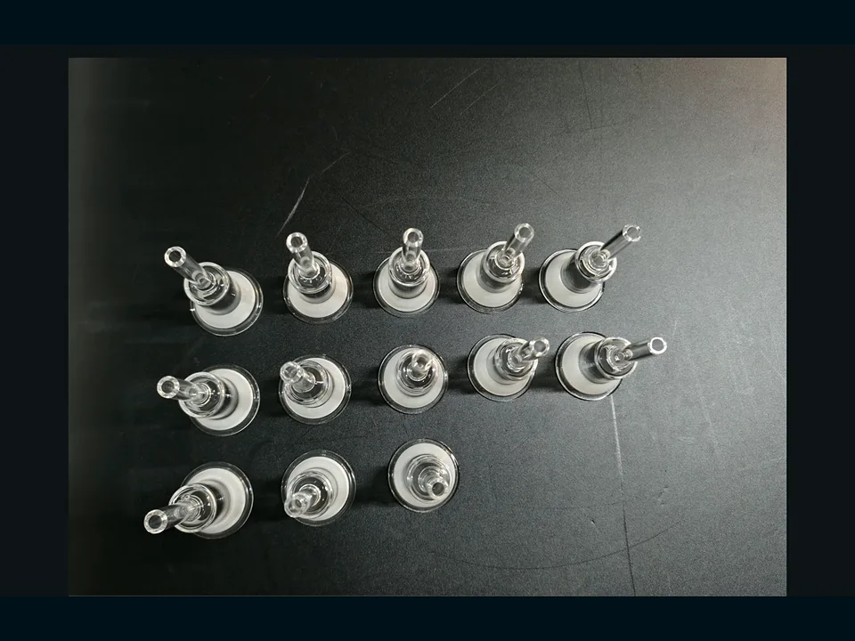 Representative WONIK quartz gas-delivery component — detail view