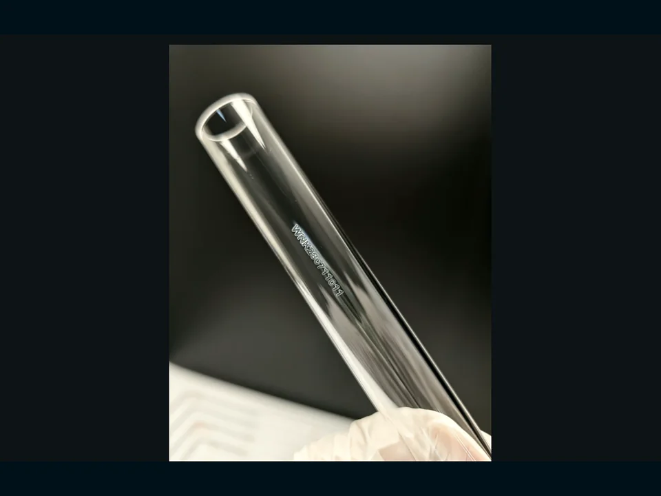 Representative WONIK quartz gas-delivery component — side view